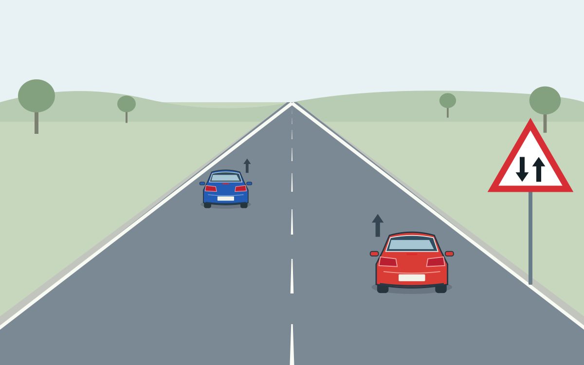 Blue and red cars travelling away in the left and right lanes; at the right is a white triangle with a red border and two black arrows, the left pointing down and the right pointing up.