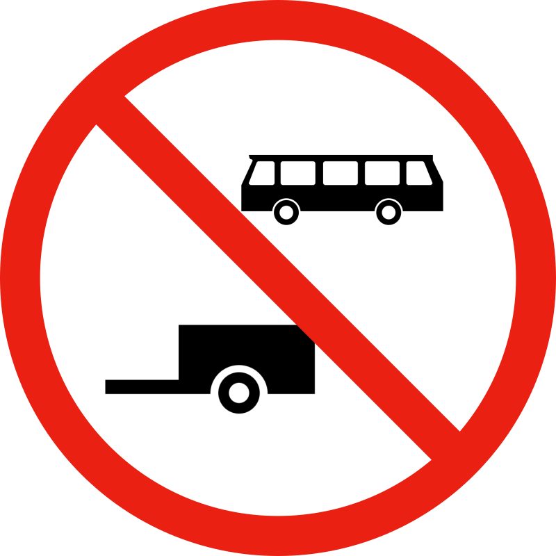 White circle with a red border and a red diagonal stripe from upper left to lower right; a black bus at upper right and a black single-axle trailer at lower left, both oriented left.