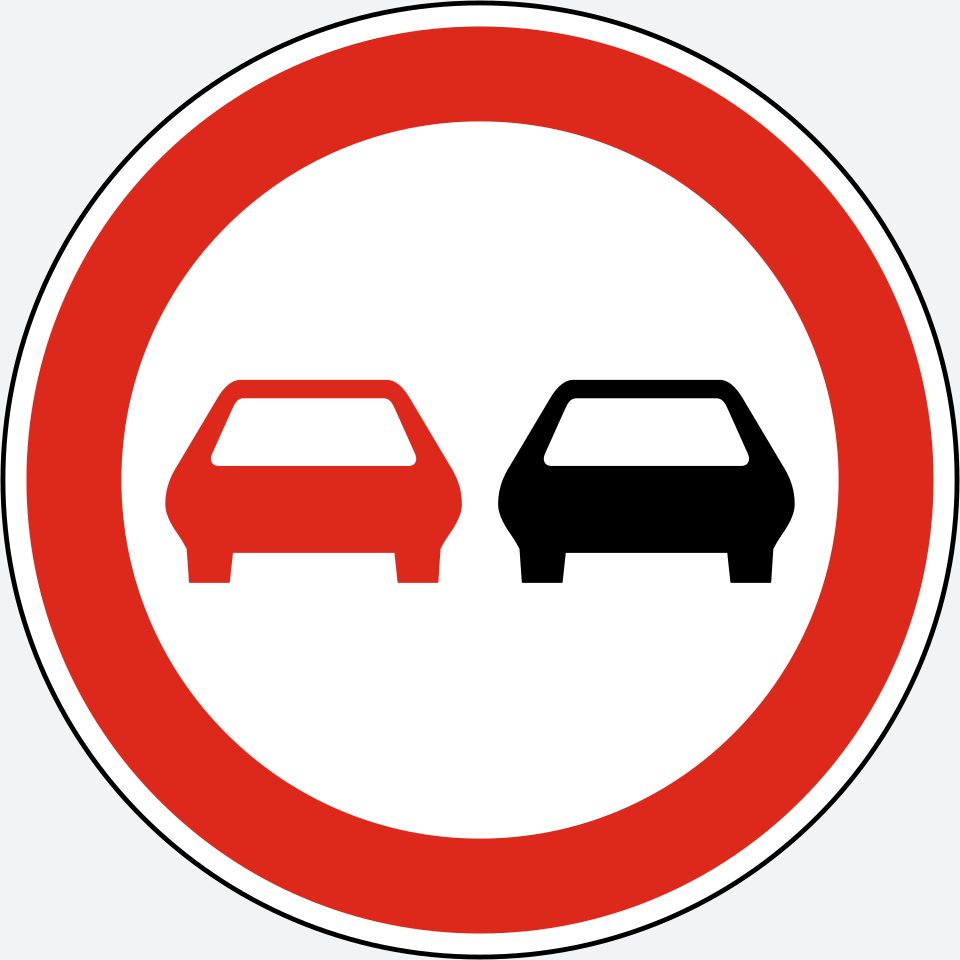 A white circular sign with a red border, a red car silhouette on the left and a black car silhouette on the right.