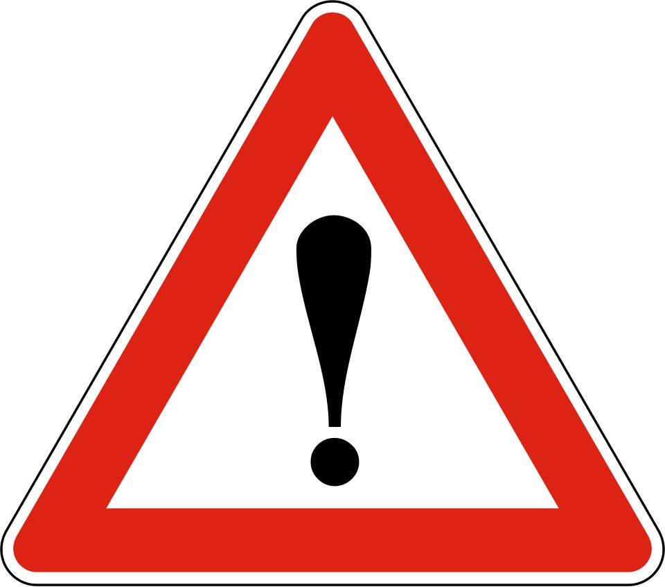 Red-bordered triangle containing a black exclamation mark.