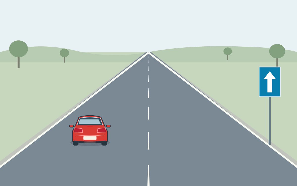 A red car travelling away in the left lane of a rural road; at the right is a blue rectangular panel with one white upward arrow.