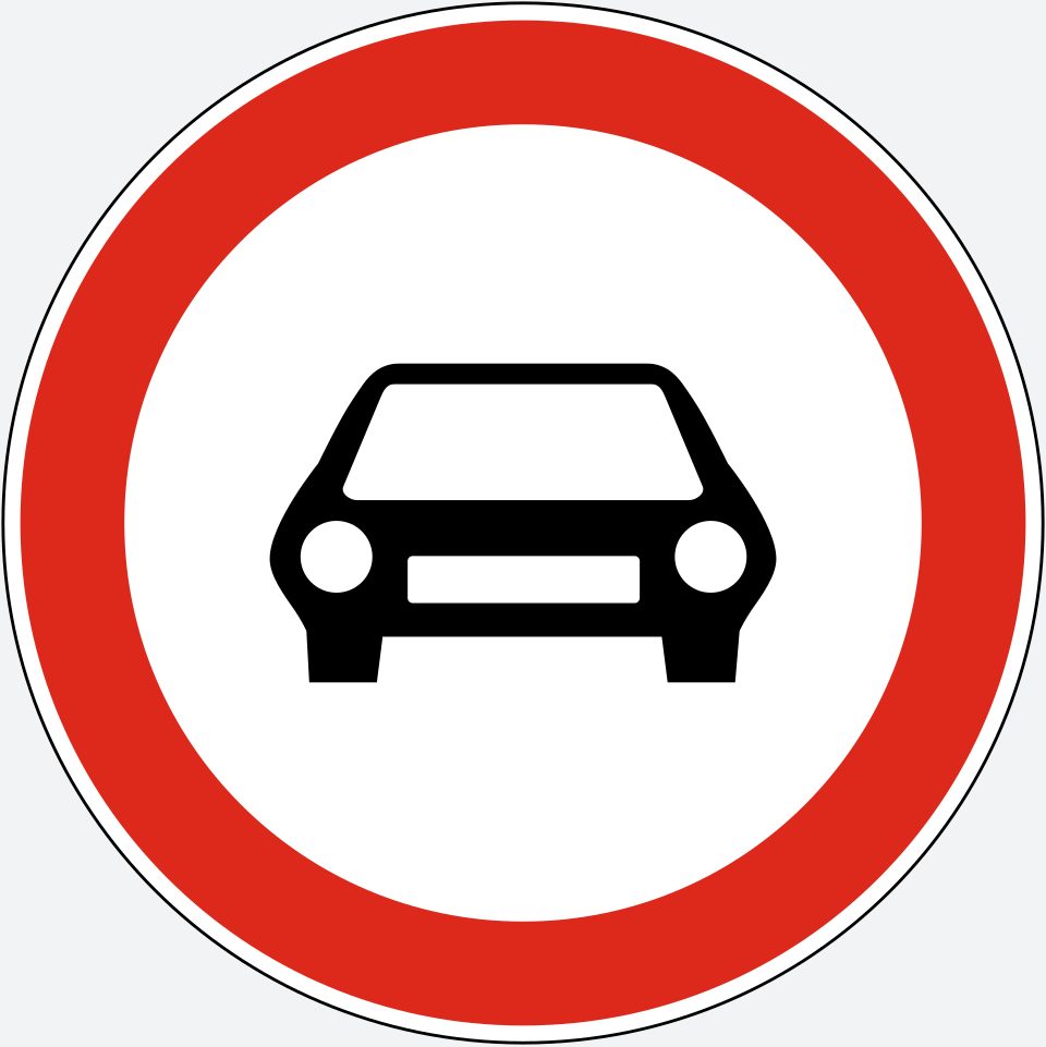White circle with a red border; a black car silhouette viewed from the front.