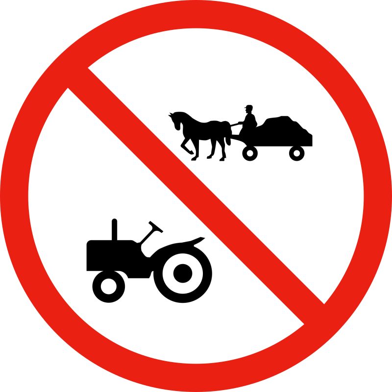 White circle with a red border and a red diagonal stripe from upper left to lower right; a black horse pulling a cart at upper right and a black tractor at lower left, both facing left.