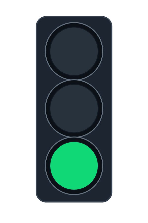 Vertical three-lamp traffic signal with only the bottom green lamp illuminated.