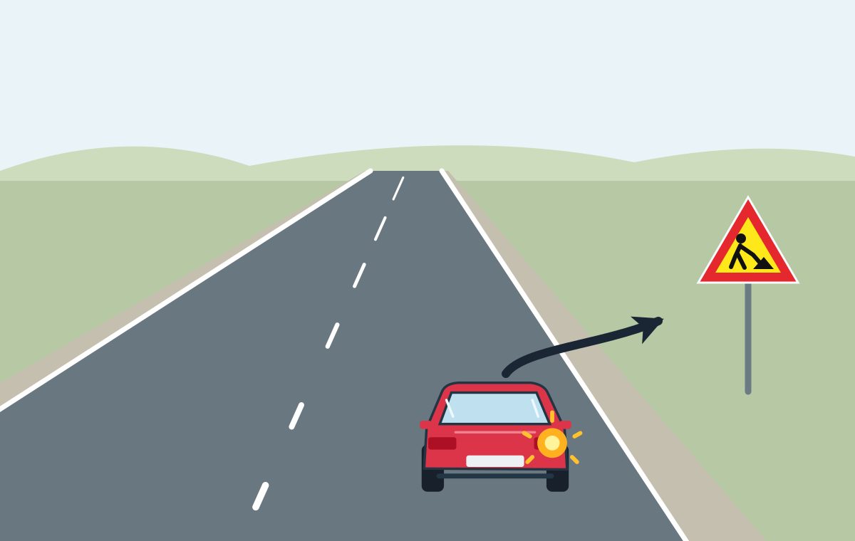 Red car signals right and its path crosses the solid right edge line; a yellow roadworks warning sign stands beside the road.