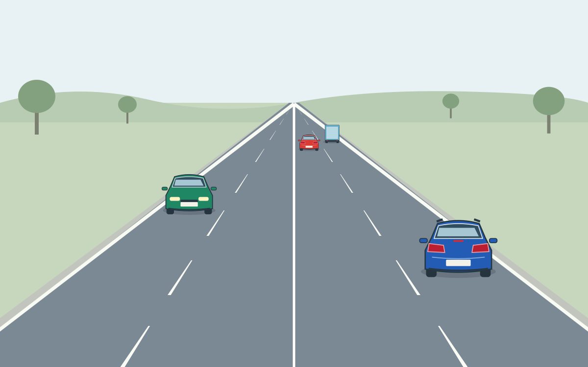 A four-lane rural two-way road with a solid centre line, an approaching green car, a blue car travelling away, and a distant red car and blue truck.