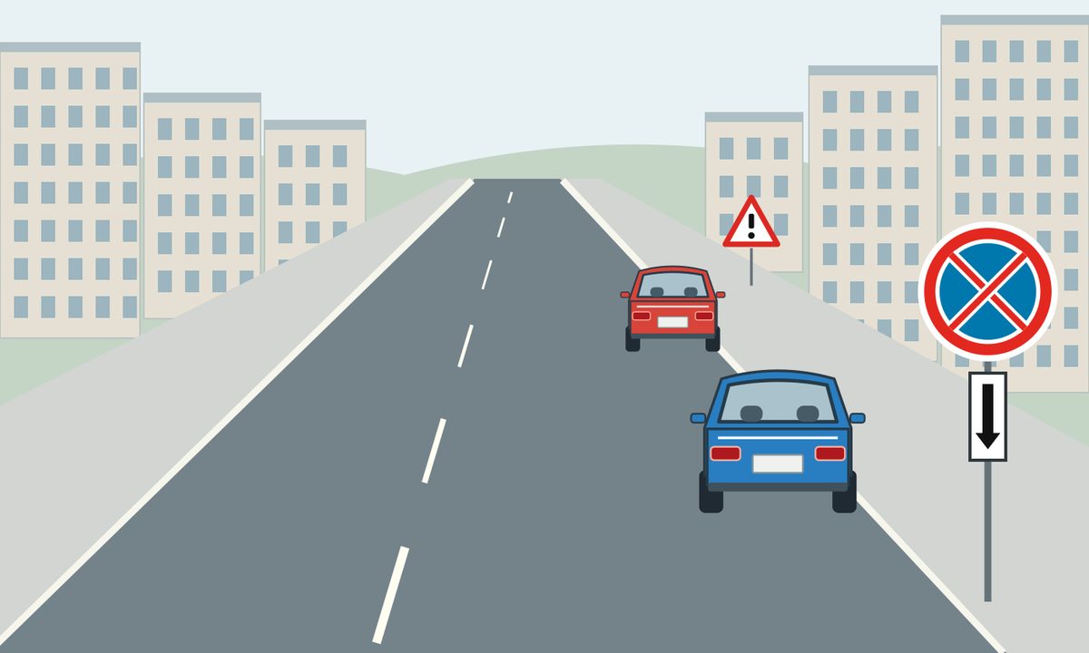 Red and blue cars beside a kerb, with a circular sign and downward-arrow plate.