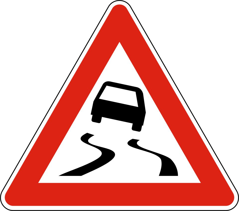 Red-bordered upright triangle; car with two winding tyre tracks below it.