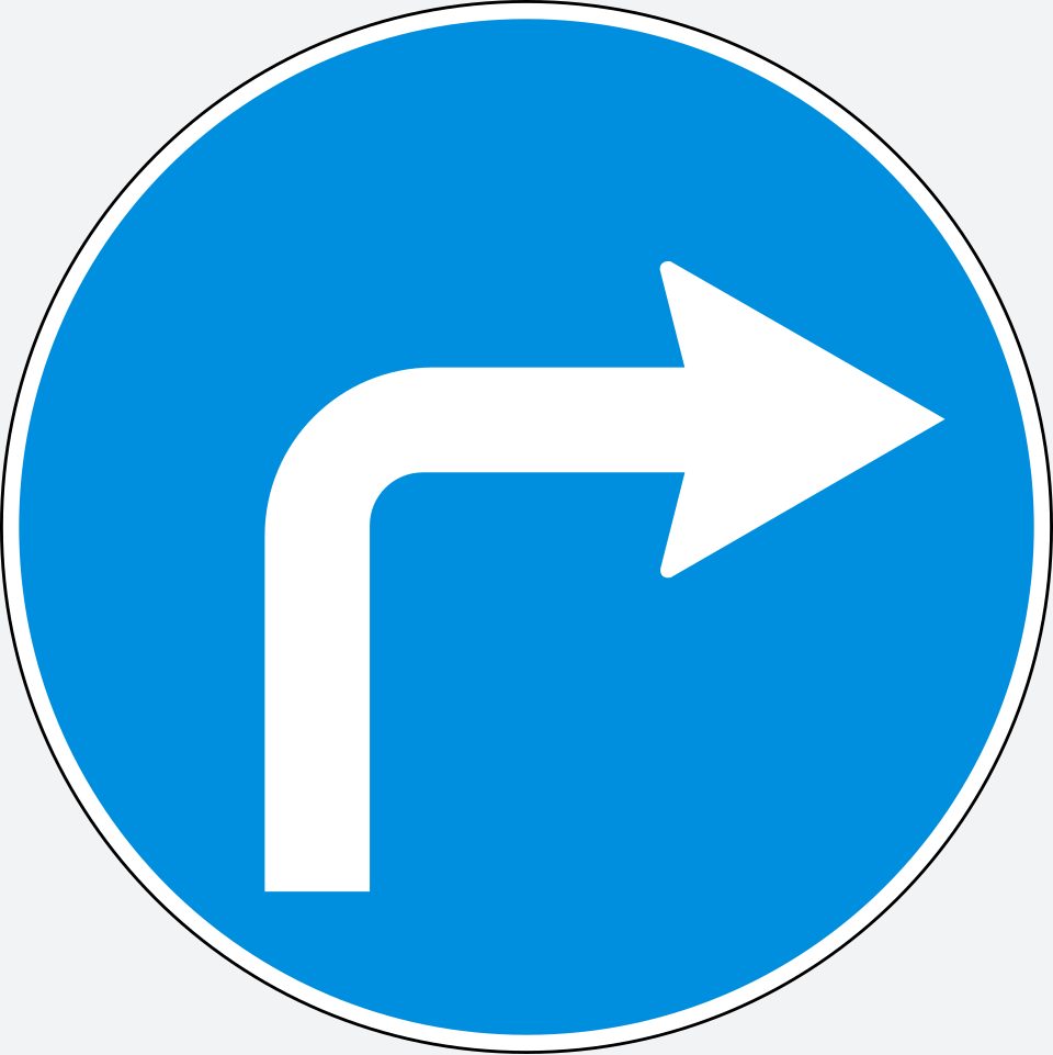A blue circular sign with a white arrow curving to the right.