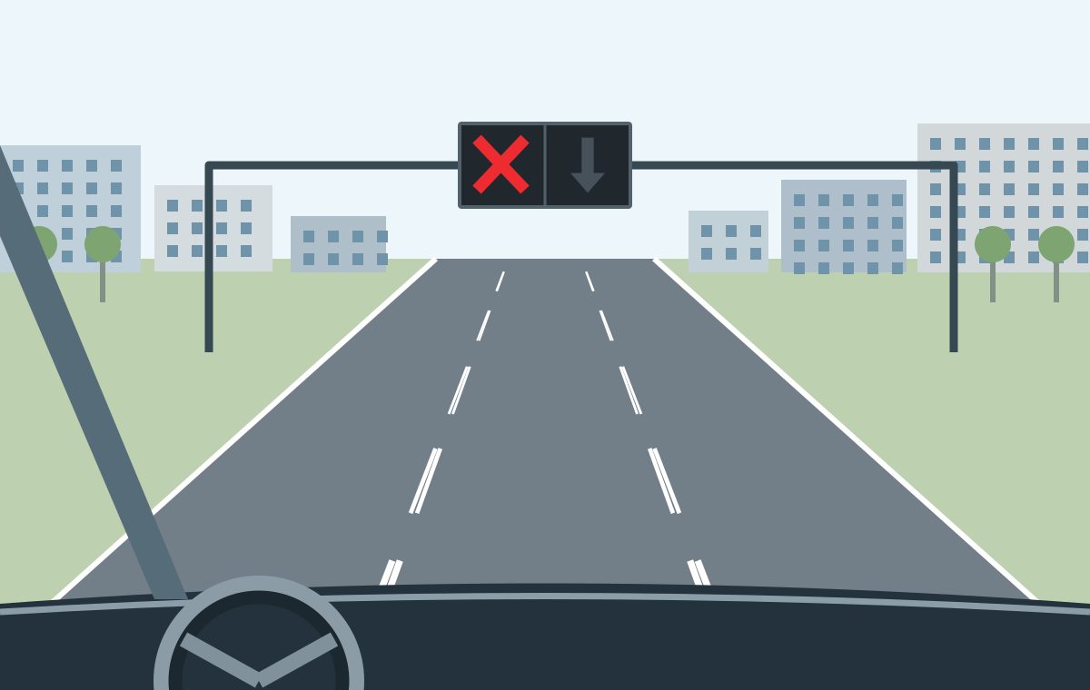 Driver view in a middle lane beneath a red cross, with paired broken lane markings.