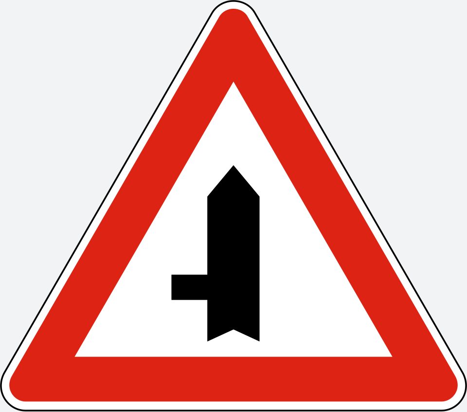 Red-bordered upright triangle; thick upright arrow-topped stem with a thinner branch to the left.