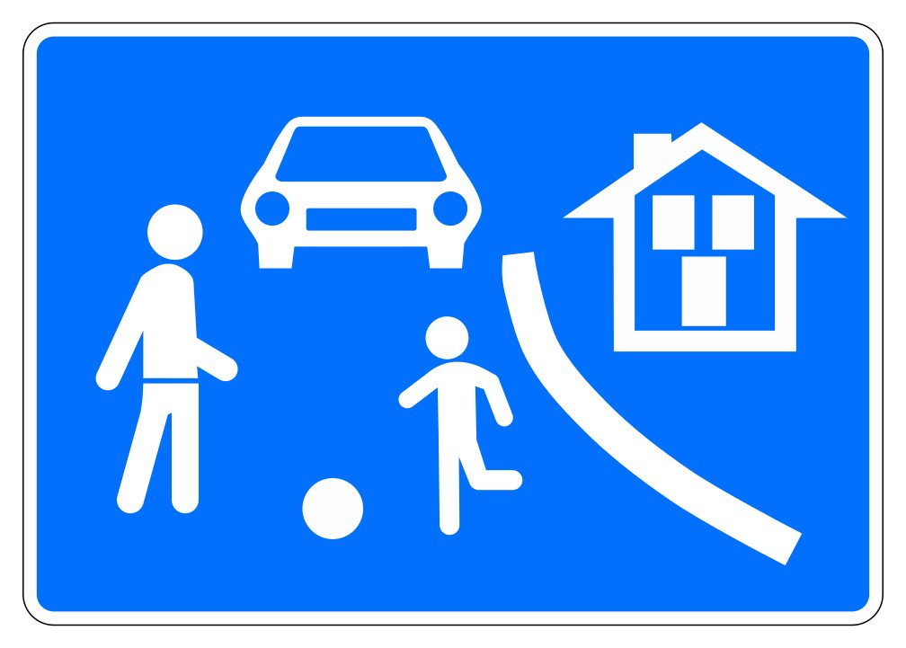 Blue rectangular sign with white symbols of an adult, a child, a ball, a front-facing car, a house and a curved boundary.